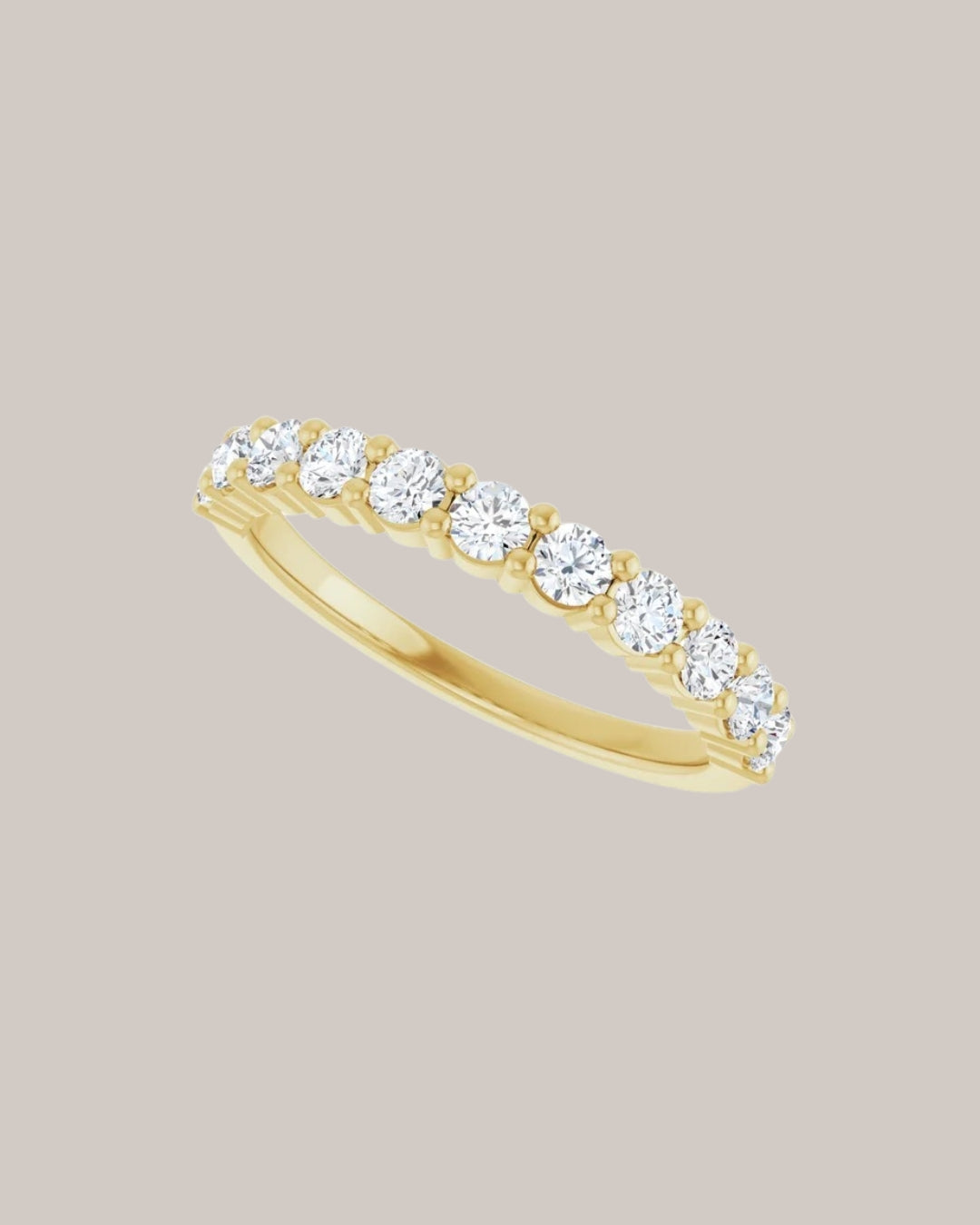0.50ctw Shared prong half diamond band with round diamonds in 14K gold
