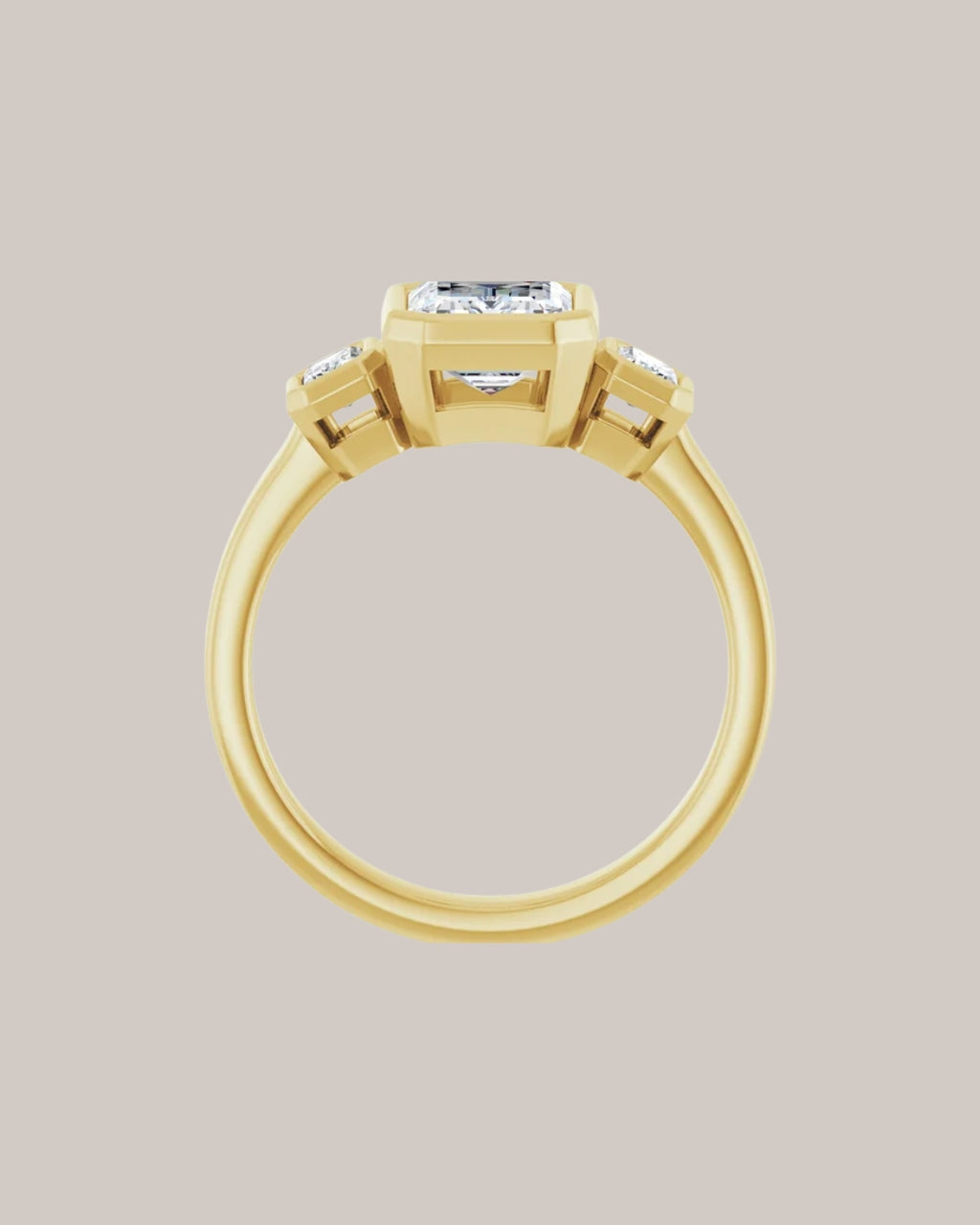 Emerald cut three stone engagement ring with 1.75 ct lab grown centre diamond and emerald cut side diamonds