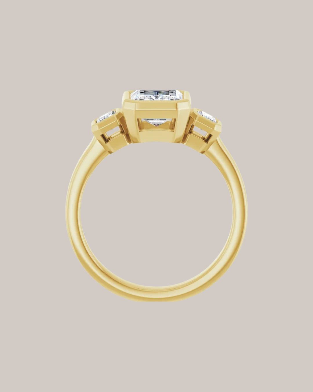 Emerald cut three stone engagement ring with 1.75 ct lab grown centre diamond and emerald cut side diamonds
