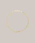Engravable 14K yellow gold bracelet with polished centre plate 
