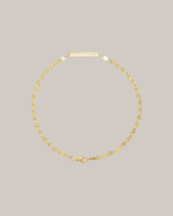 Engravable 14K yellow gold bracelet with polished centre plate 
