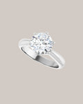 Classic 2ct six prong solitaire engagement ring with substantial polished white gold band