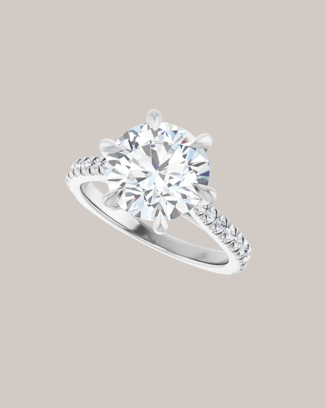 Six prong engagement ring with tapered diamond shank and 3 ct centre diamond