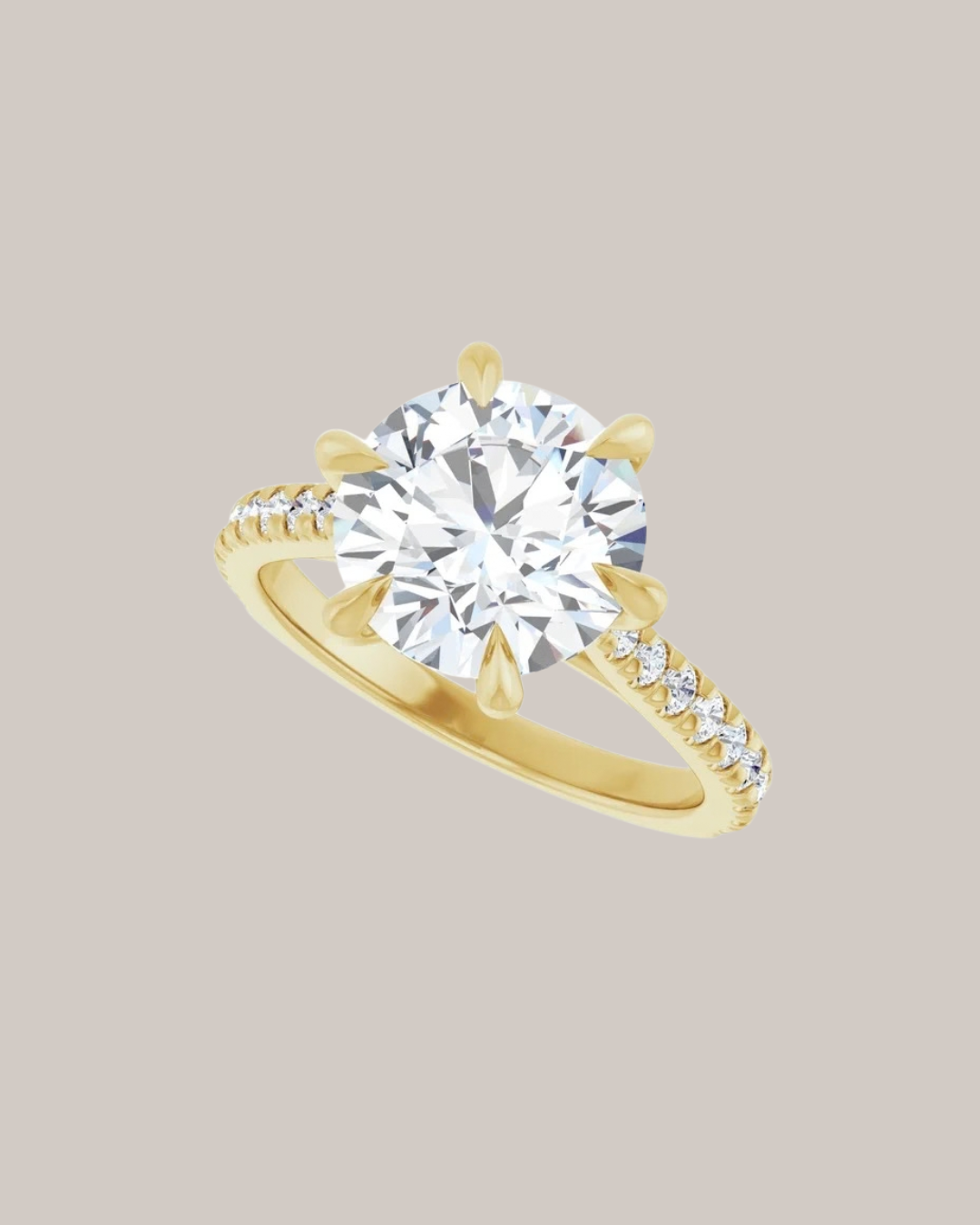 Six prong engagement ring with tapered diamond shank and 3 ct centre diamond