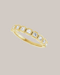 14K yellow gold bezel band with 9 lab grown Asscher cut diamonds totaling 0.50 ctw