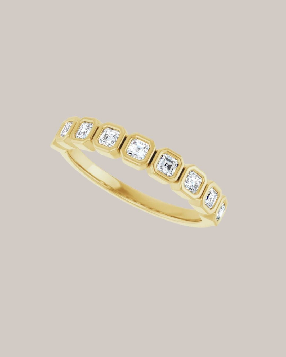 14K yellow gold bezel band with 9 lab grown Asscher cut diamonds totaling 0.50 ctw