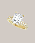 14K yellow gold emerald cut engagement ring with 12 lab grown baguette diamond accents