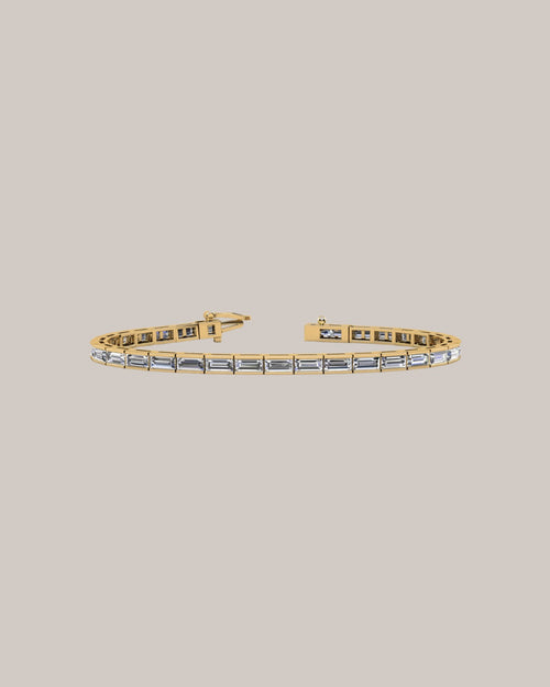 7 inch baguette lab grown diamond tennis bracelet with 28 diamonds totaling 11.20 ctw in 14K yellow gold