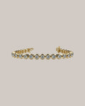 7 inch bezel set lab grown diamond tennis bracelet with 27 round diamonds totaling 4.00 ctw in 14K yellow gold
