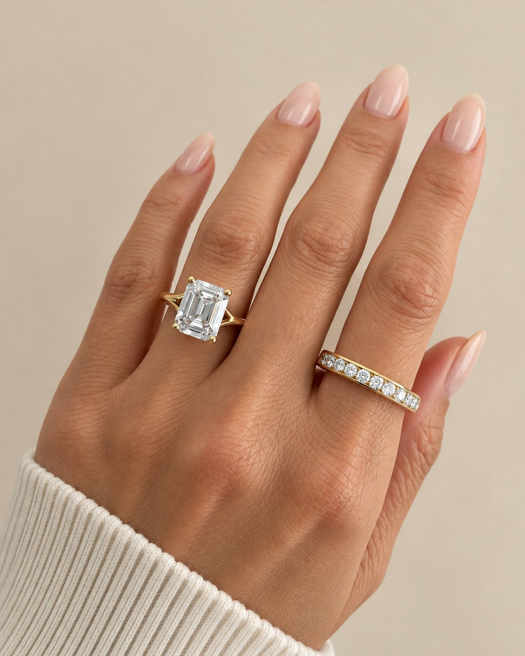 Emerald cut engagement ring split shank setting shown with 3.50 ct centre diamond and channel band
