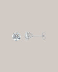 14K white gold three prong diamond studs with 2 lab grown diamonds 
