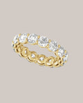 Low profile lab grown diamond eternity band with 15 round diamonds totaling 4.75 ctw in 14K yellow gold