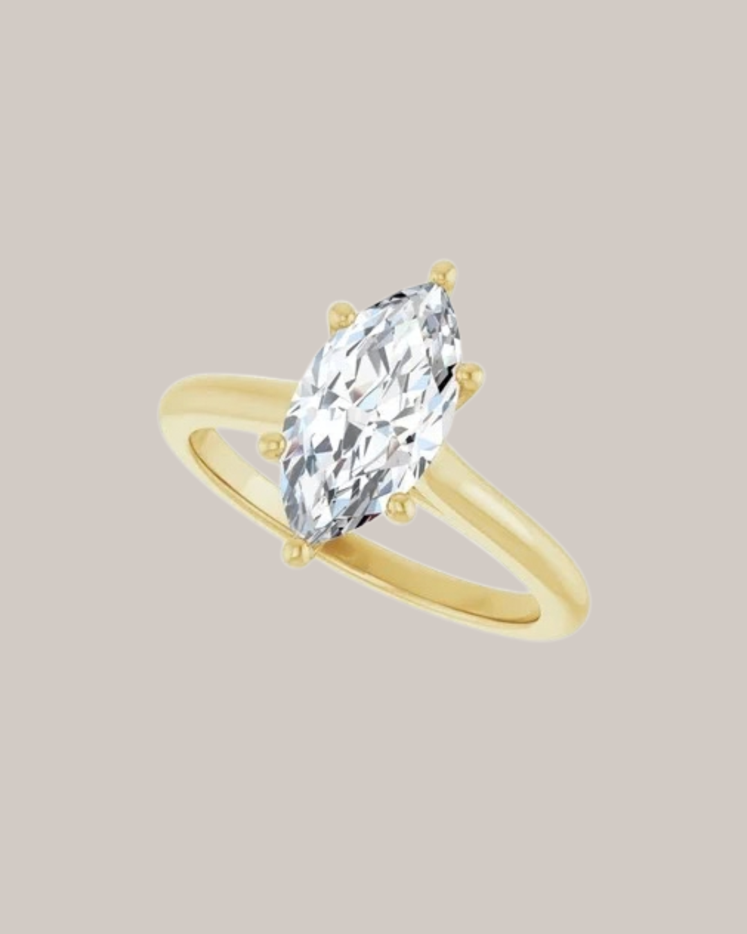 14K yellow gold marquise solitaire engagement ring setting shown with 1.50 ct centre diamond