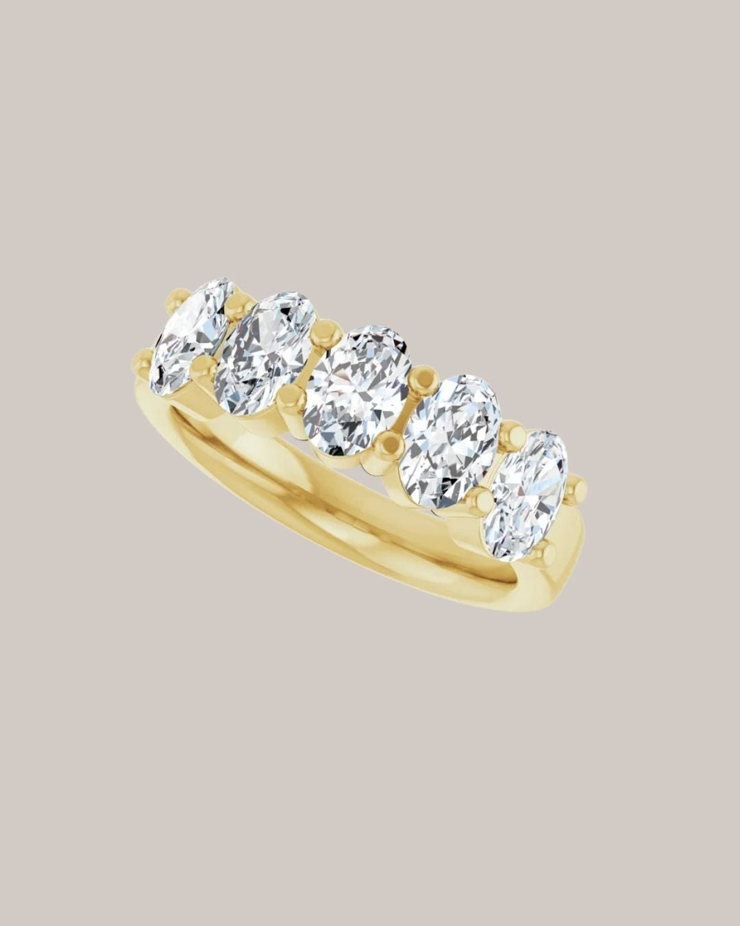 14K yellow gold five stone band with 5 lab grown oval diamonds totaling 2.00 ctw