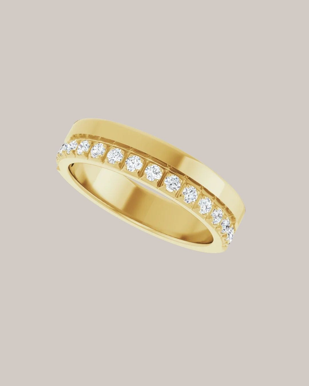 Wide yellow gold band set with round lab grown diamonds