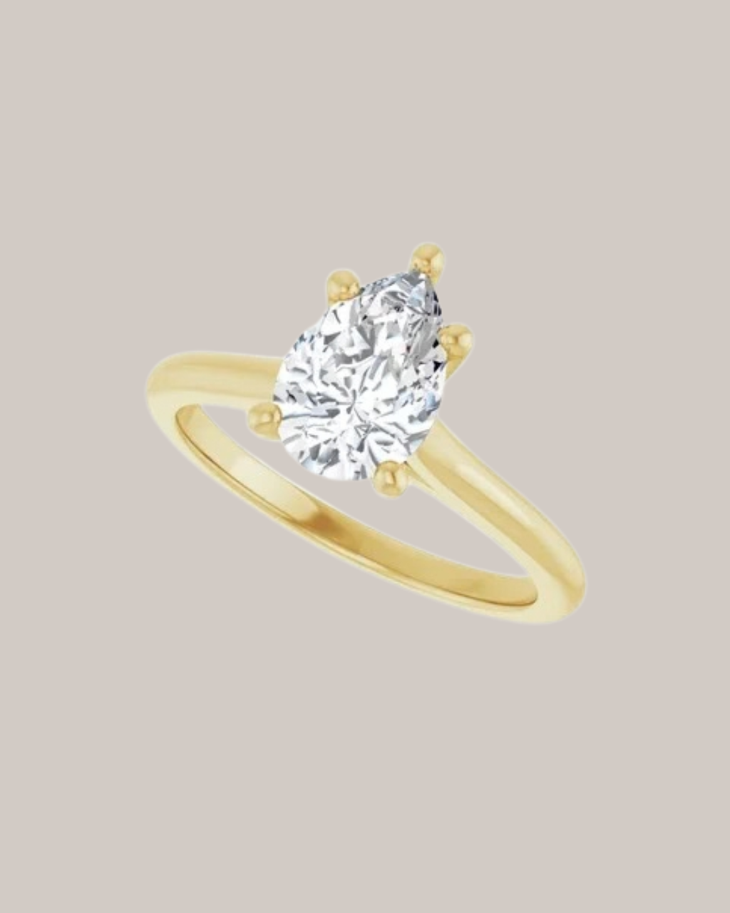 14K yellow gold pear solitaire engagement ring setting shown with 2.00 ct centre diamond