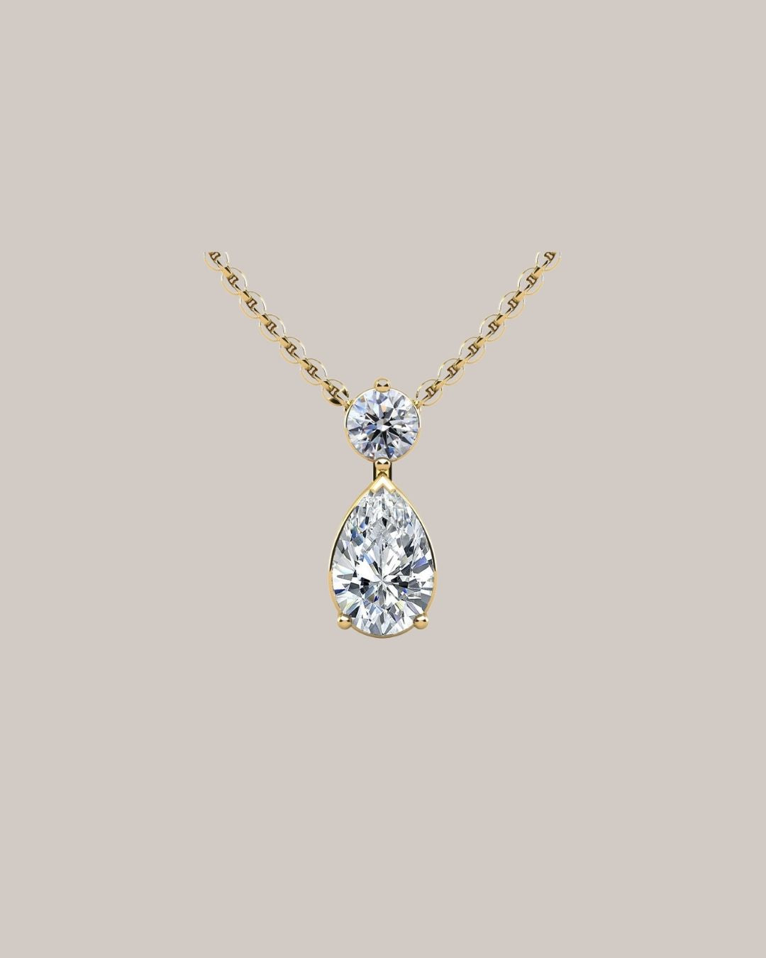 Yellow Gold 1.20 ctw pear and round lab grown diamond pendant
