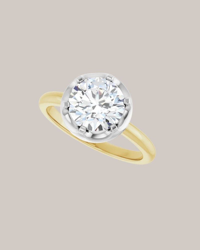 14K two tone gold vintage inspired round engagement ring shown with a 2.00 ct centre diamond