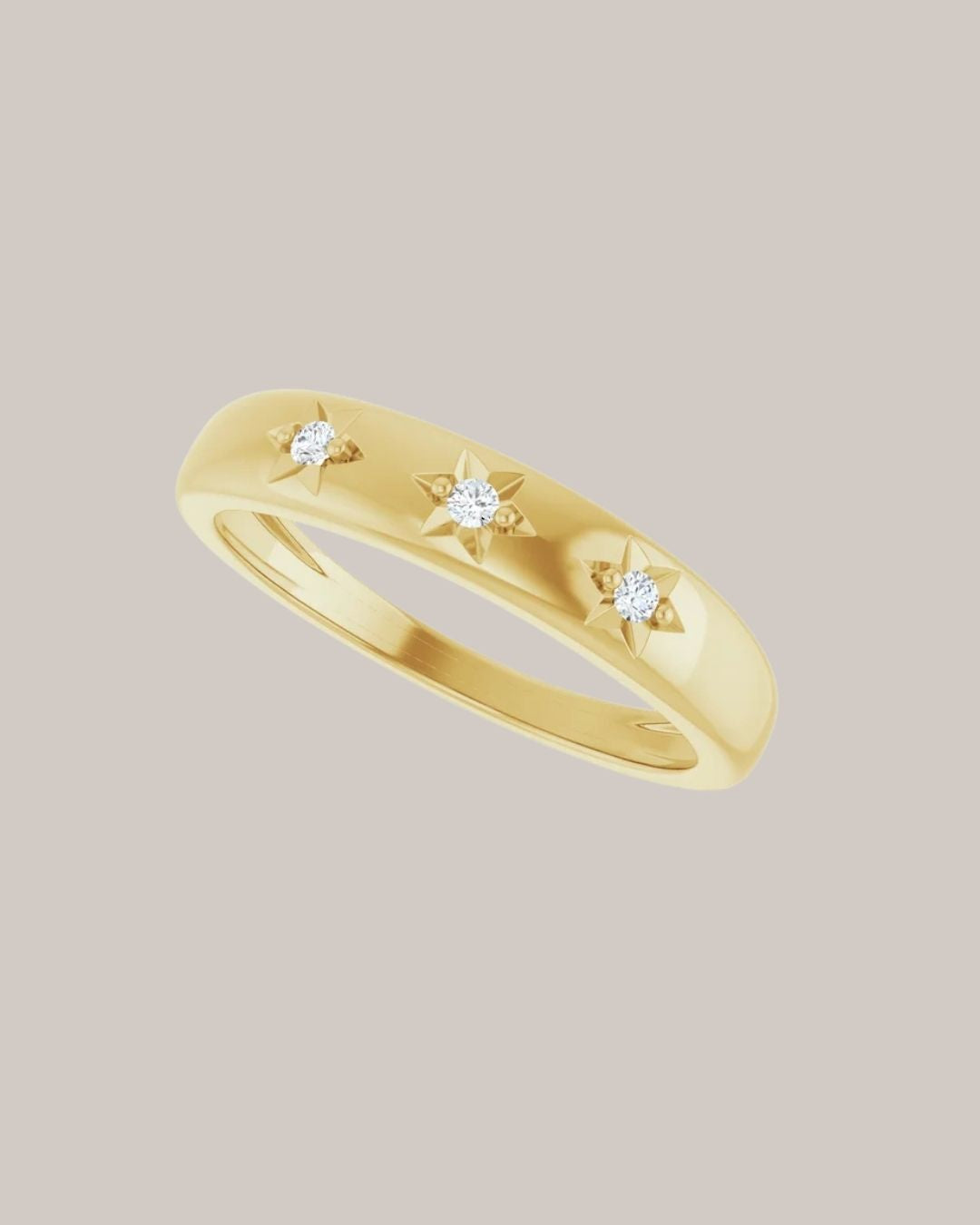 14K yellow gold starburst band with 3 lab grown diamonds totaling 0.05 ctw