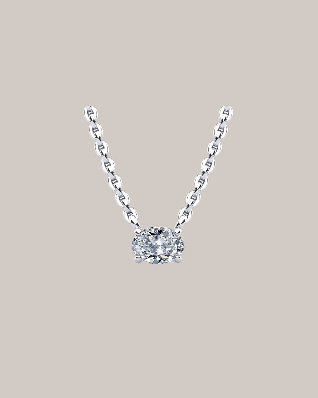 White Gold 1.00 ct east west oval diamond pendant on an 18 inch cable chain
