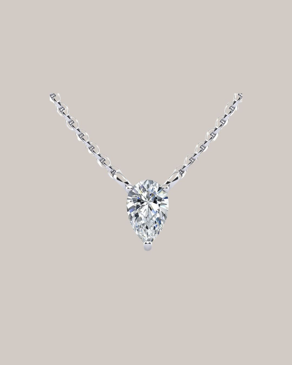 White Gold 1.00 ct pear shaped diamond solitaire pendant on an 18 inch cable chain