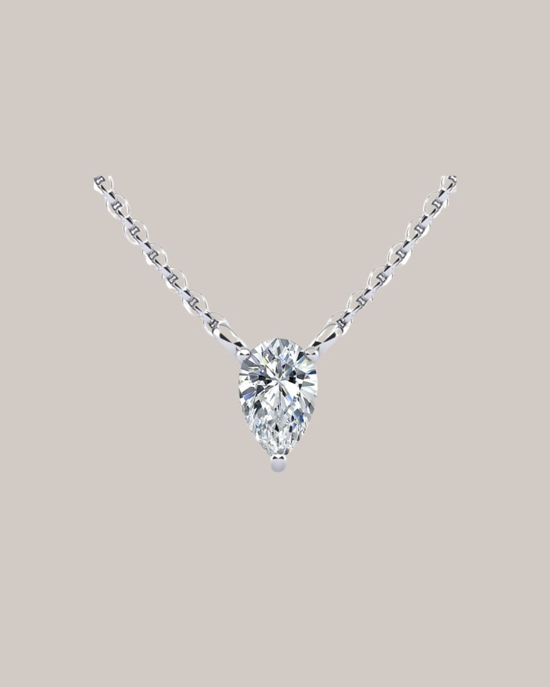 White Gold 1.00 ct pear shaped diamond solitaire pendant on an 18 inch cable chain
