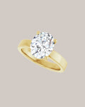 Wide Band Solitaire setting shown with a 2.00 ct oval diamond