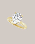 Hidden halo engagement ring with 2.40 mm diamond band and lab grown diamond accents
