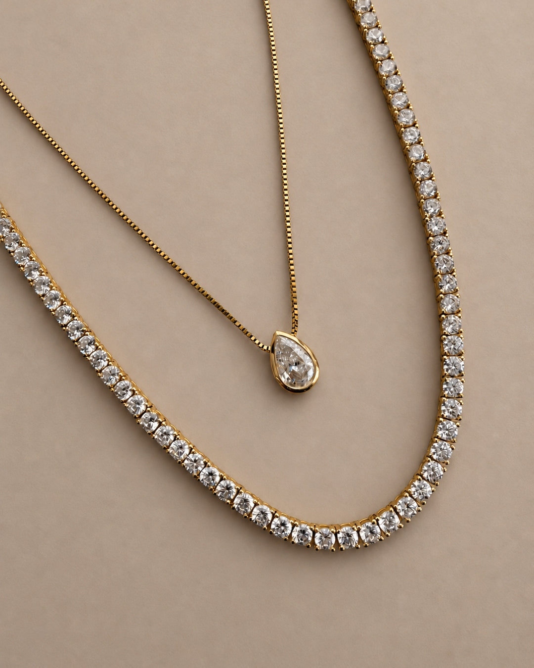 0.91 ct natural pear diamond bezel pendant in 14K yellow gold