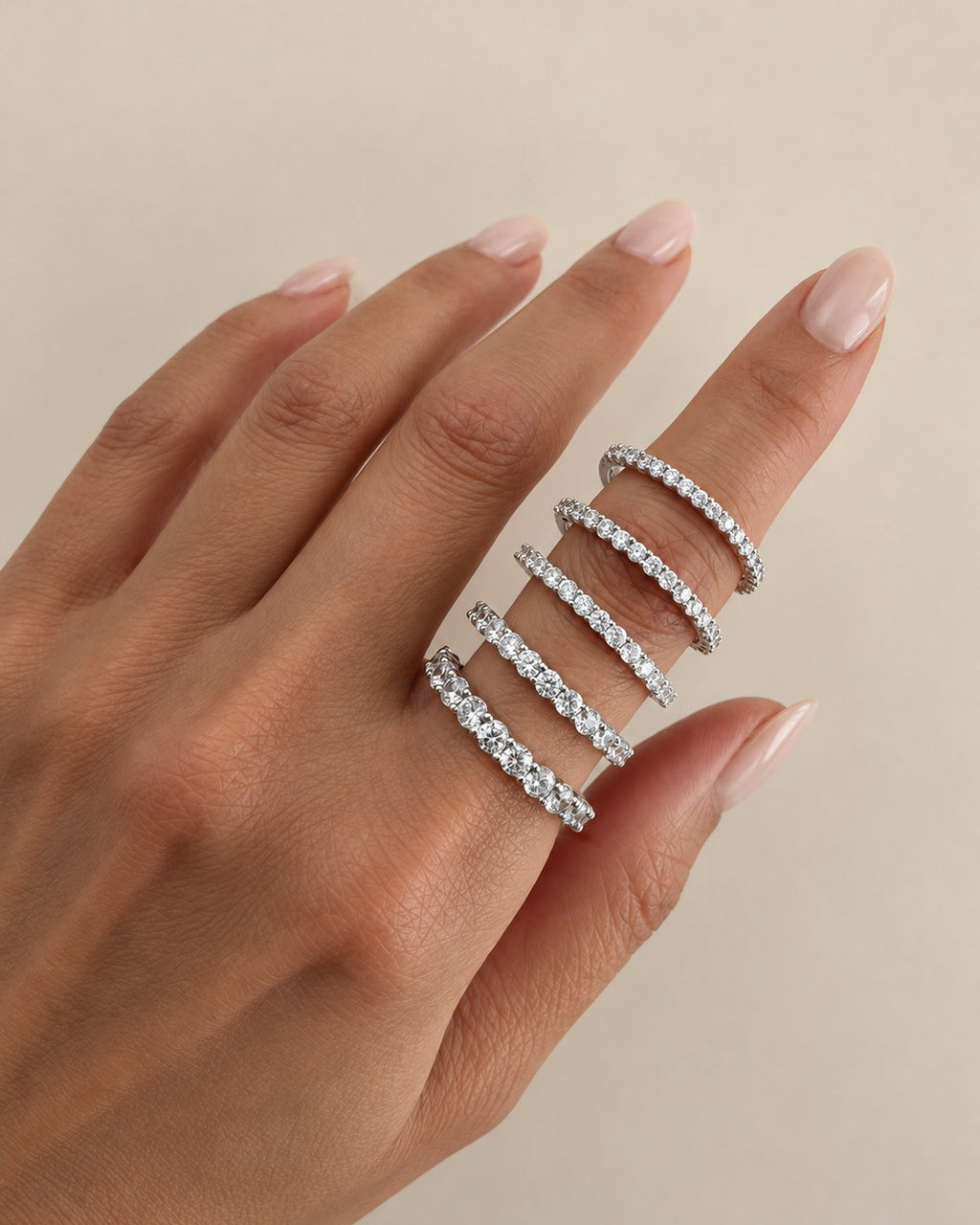 Shared prong half diamond band with round diamonds in 14K gold
