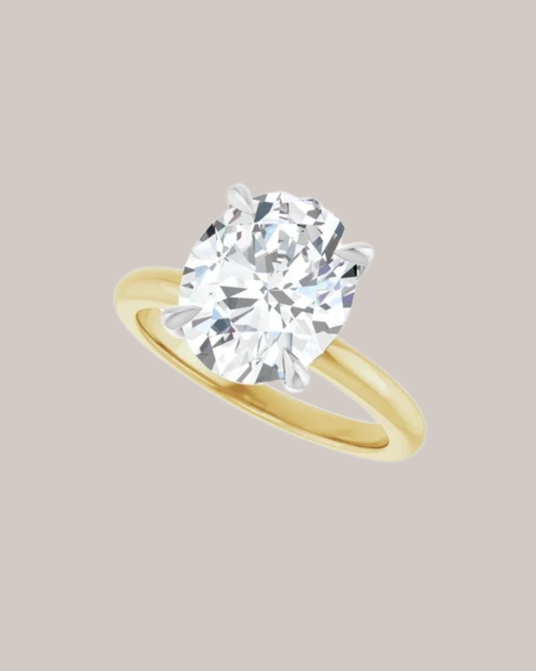 Four prong solitaire engagement ring with sculpted gold setting, shown with oval centre diamond
