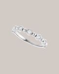 Bezel and bead diamond band with 7 lab grown round diamonds totaling 0.20 ctw in 14K white gold
